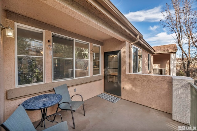 view of patio / terrace featuring a balcony