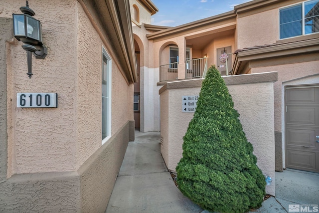 view of property exterior with stucco siding