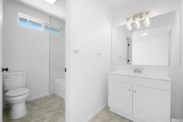 bathroom featuring toilet, bathing tub / shower combination, baseboards, and vanity