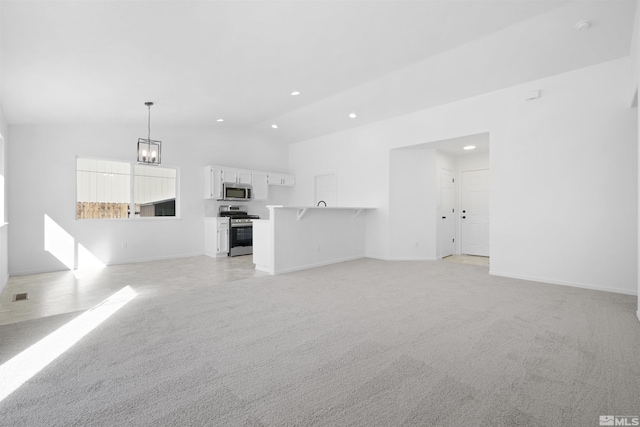 unfurnished living room with a chandelier, recessed lighting, light colored carpet, visible vents, and baseboards