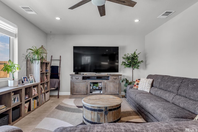 living room featuring ceiling fan, visible vents, and recessed lighting