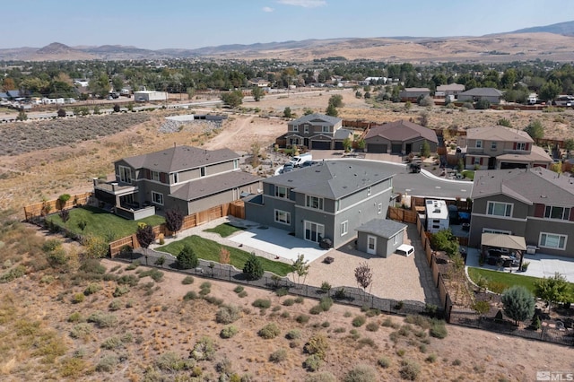 aerial view featuring a residential view and a mountain view