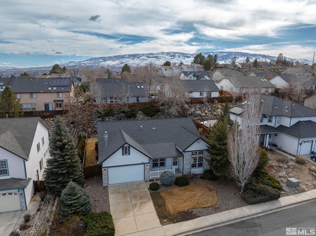 bird's eye view featuring a residential view and a mountain view