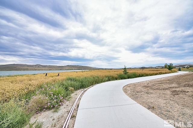 view of home's community featuring a water view