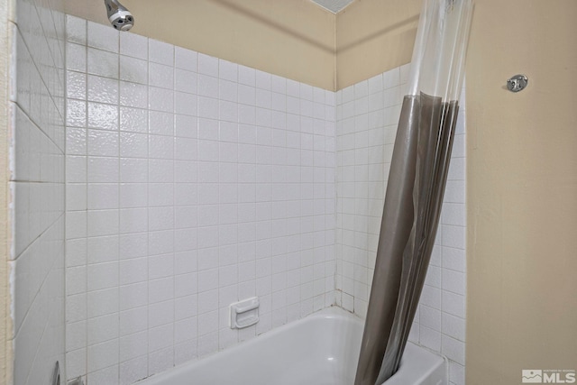 full bath with shower / bathtub combination with curtain