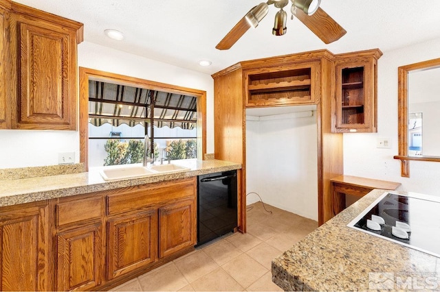 kitchen with brown cabinetry, a ceiling fan, a sink, electric stovetop, and dishwasher