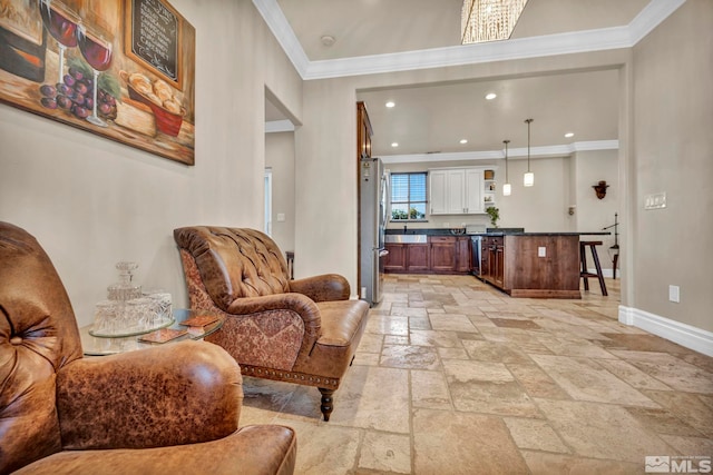 sitting room with recessed lighting, baseboards, stone tile flooring, and ornamental molding