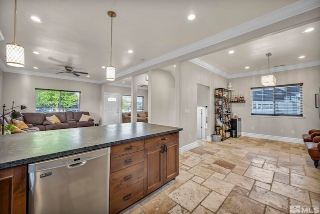 kitchen featuring dark countertops, pendant lighting, stone tile floors, and stainless steel dishwasher