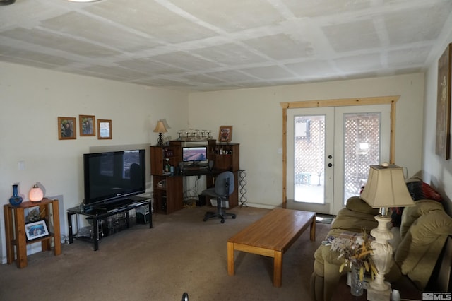 living area with carpet floors and french doors