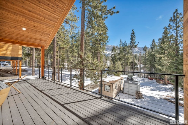 view of snow covered deck