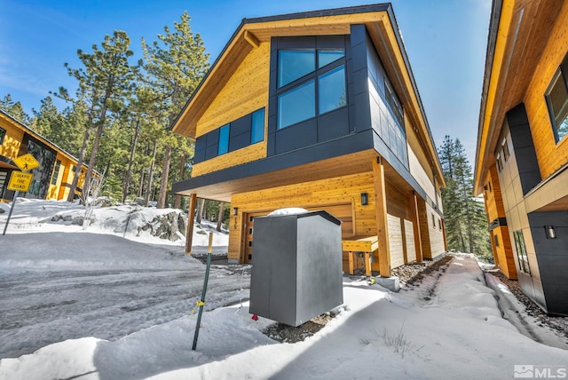 view of snow covered house