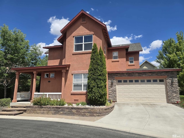 view of front of home featuring driveway, covered porch, stone siding, and stucco siding