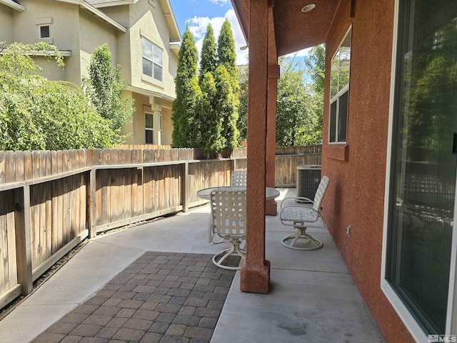 view of patio / terrace featuring a fenced backyard and central AC