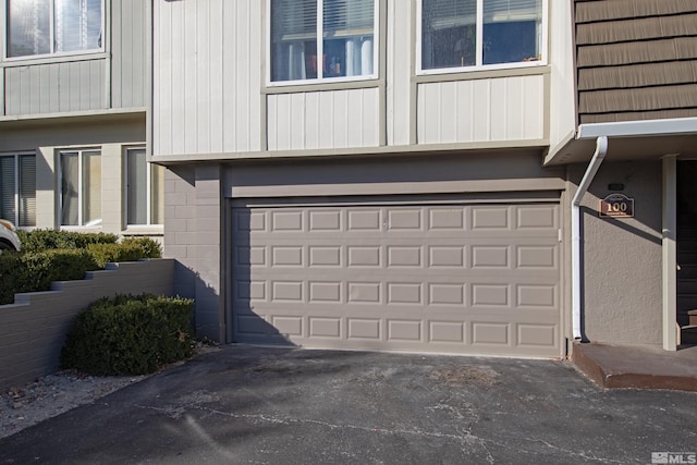 garage featuring driveway