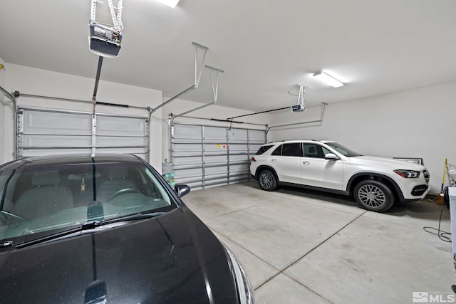 garage featuring a garage door opener