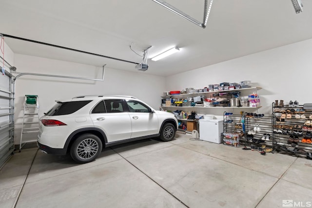 garage featuring a garage door opener