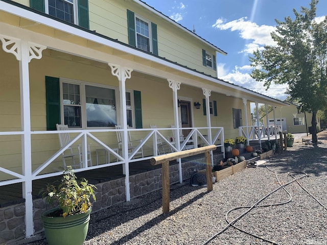 exterior space featuring covered porch