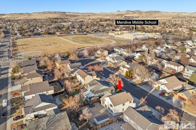 bird's eye view featuring a residential view and a mountain view