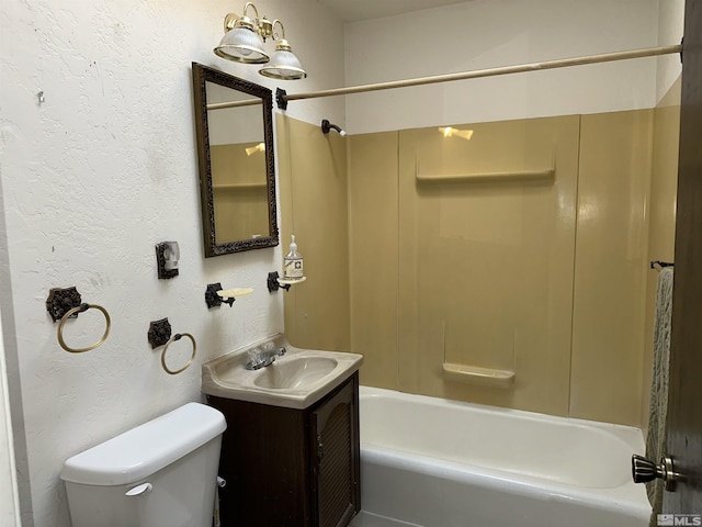 full bathroom with shower / bath combination, a textured wall, vanity, and toilet