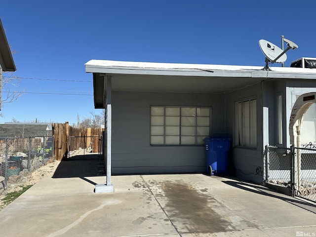 view of property exterior with fence