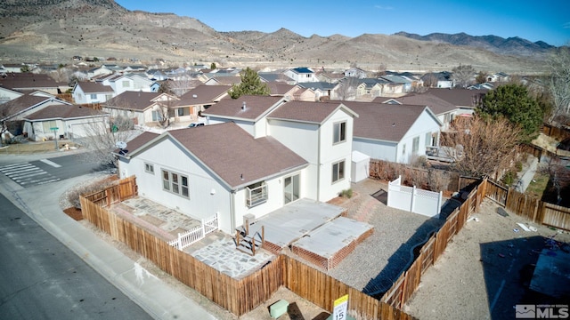 aerial view with a residential view and a mountain view