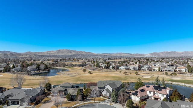 aerial view featuring a residential view and a water and mountain view