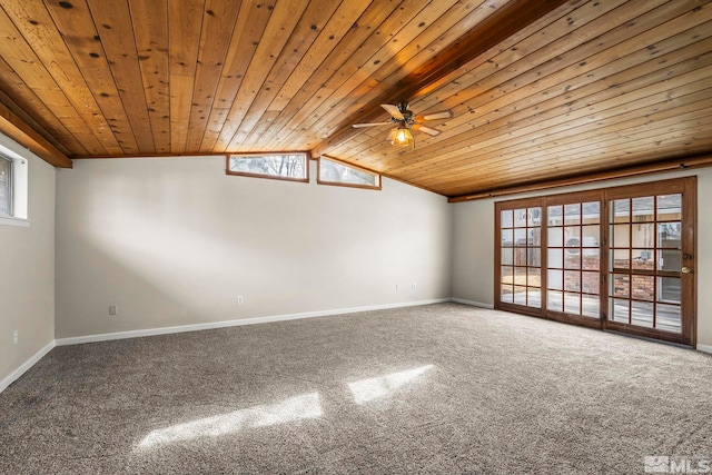 carpeted spare room with wooden ceiling, a wealth of natural light, and baseboards