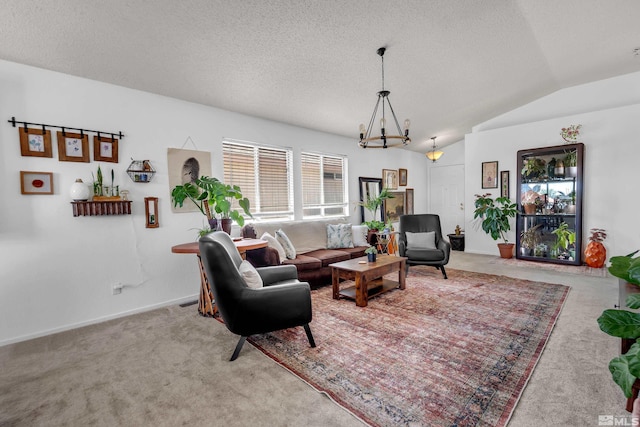 carpeted living room with vaulted ceiling, a textured ceiling, and an inviting chandelier