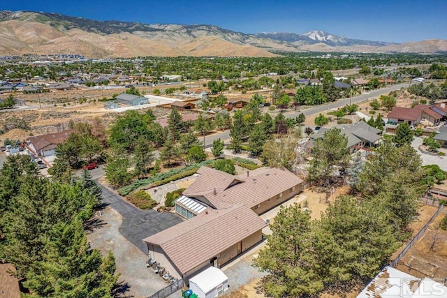 birds eye view of property with a residential view and a mountain view