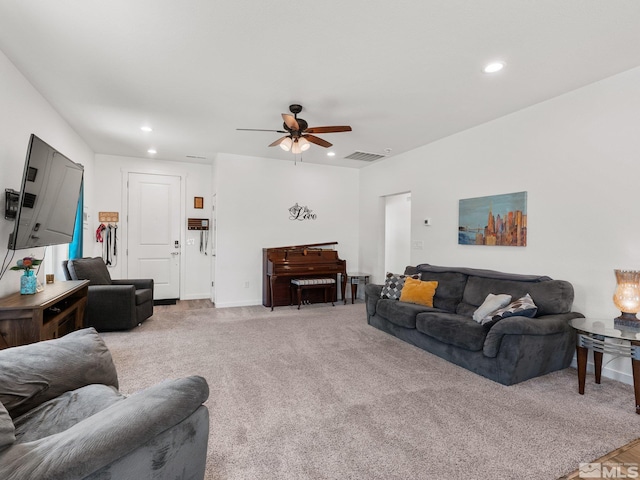 living area with recessed lighting, visible vents, a ceiling fan, and light colored carpet