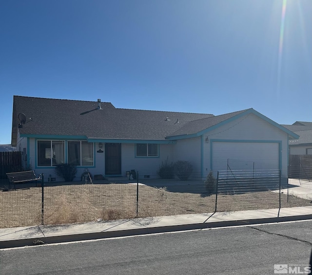 single story home with crawl space, driveway, an attached garage, and fence