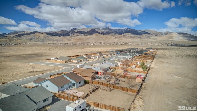 bird's eye view with a residential view and a mountain view