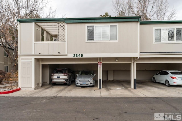 view of front of house with covered parking