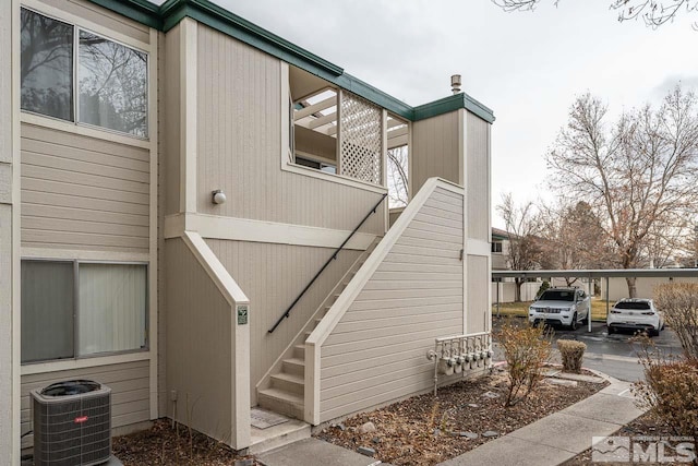 doorway to property with central AC