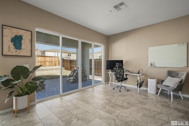 office with marble finish floor, baseboards, and visible vents