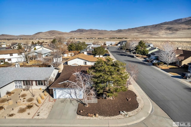 bird's eye view featuring a residential view and a mountain view