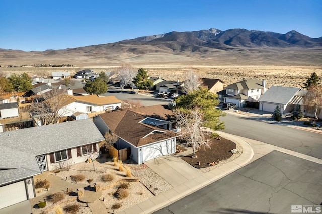 aerial view featuring a residential view and a mountain view