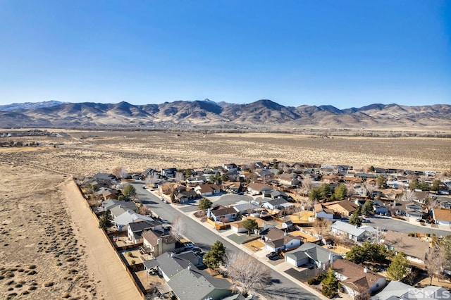 drone / aerial view with a residential view and a mountain view