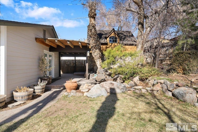 view of yard with fence