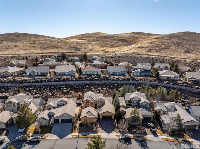 birds eye view of property featuring a residential view and a mountain view