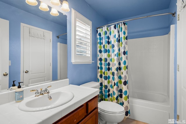 bathroom with toilet, shower / bath combo with shower curtain, and vanity