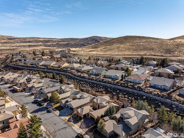 aerial view with a residential view and a mountain view