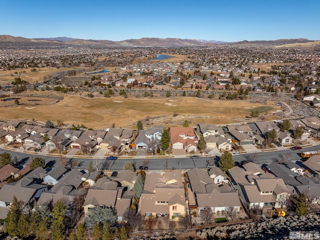 birds eye view of property with a residential view and a mountain view