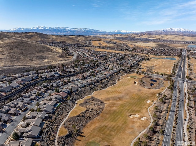 birds eye view of property with a residential view and a mountain view