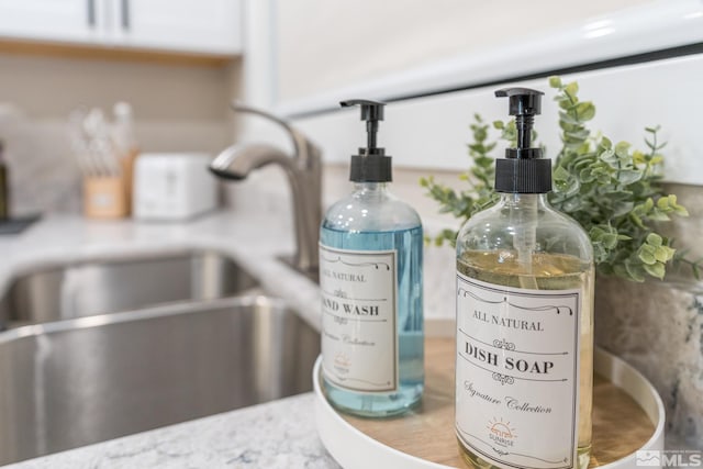 details with light countertops and a sink