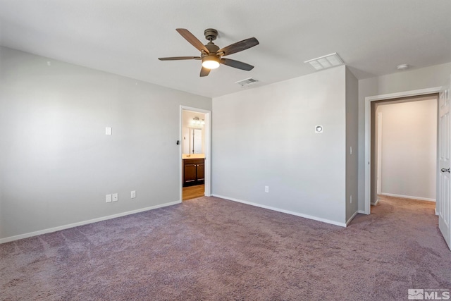 unfurnished bedroom featuring ceiling fan, carpet flooring, visible vents, and baseboards