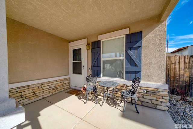 view of patio with fence