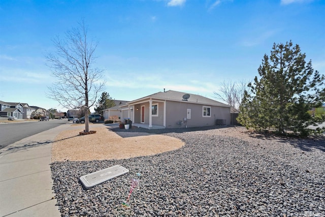 view of side of home with a residential view