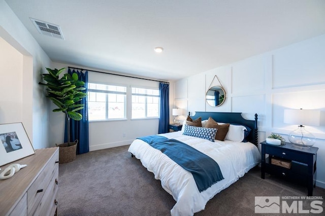 bedroom with carpet flooring and visible vents