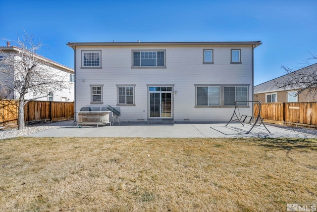 back of house with a patio area, a fenced backyard, and a yard